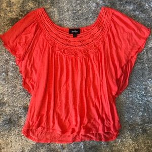 Orange summer shirt.